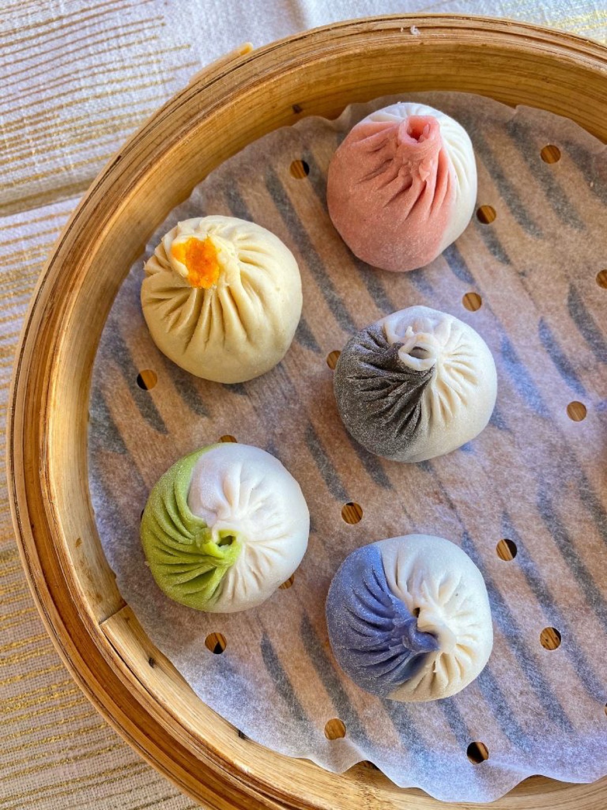 Lucky Six Soup Dumplings at Shanghai You Garden featuring six varieties of xiao long bao